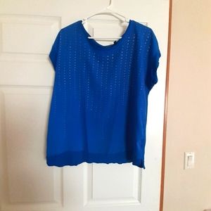 Shirt blue with silver studs.